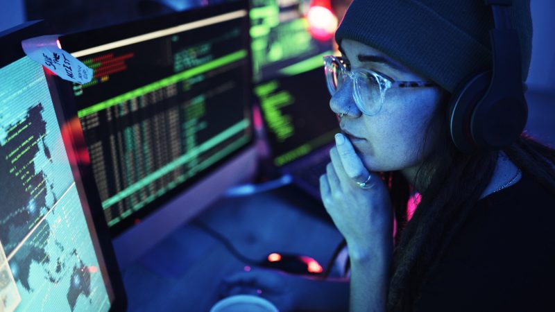 woman-computer-and-hacker-with-music-headphones-and-programming-for-cybersecurity-thinking-radio.jpg